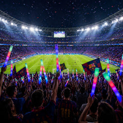 LED foam glow sticks waved by crowd in stadium sports event