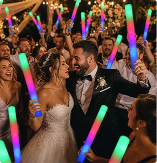 A bride and groom celebrating at a night wedding reception