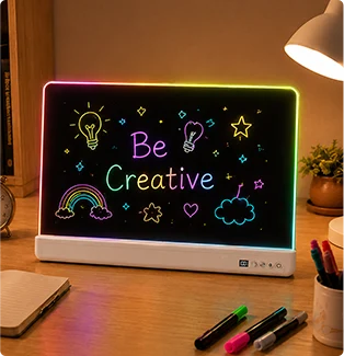 A rectangular light-up drawing board on a wooden desk